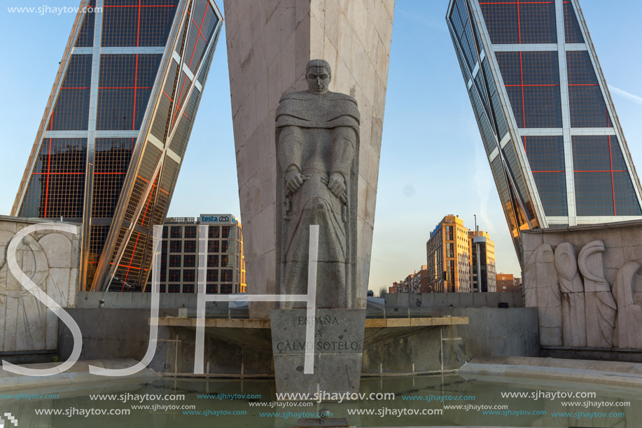 MADRID, SPAIN - JANUARY 23, 2018:  Sunrise view of Gate of Europe (KIO Towers) and Monument to Jose Calvo Sotelo at Paseo de la Castellana street in City of Madrid, Spain