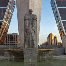 MADRID, SPAIN - JANUARY 23, 2018:  Sunrise view of Gate of Europe (KIO Towers) and Monument to Jose Calvo Sotelo at Paseo de la Castellana street in City of Madrid, Spain