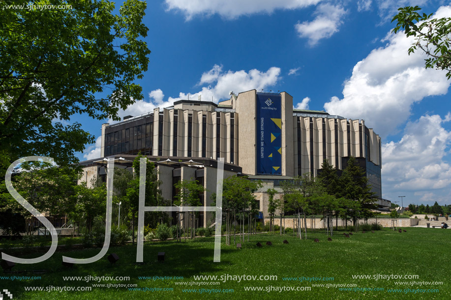 SOFIA, BULGARIA -MAY 20, 2018:  Flower garden and National Palace of Culture in Sofia, Bulgaria