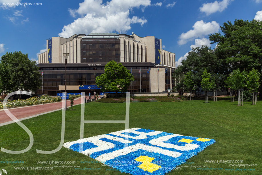 SOFIA, BULGARIA -MAY 20, 2018:  Flower garden and National Palace of Culture in Sofia, Bulgaria