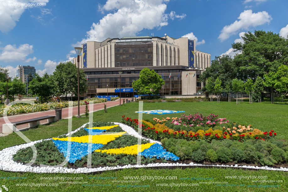 SOFIA, BULGARIA -MAY 20, 2018:  Flower garden and National Palace of Culture in Sofia, Bulgaria