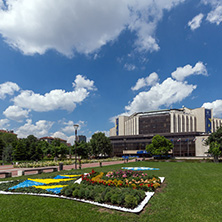 SOFIA, BULGARIA -MAY 20, 2018:  Flower garden and National Palace of Culture in Sofia, Bulgaria
