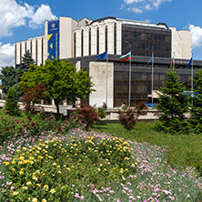SOFIA, BULGARIA -MAY 20, 2018:  Flower garden and National Palace of Culture in Sofia, Bulgaria