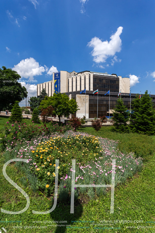 SOFIA, BULGARIA -MAY 20, 2018:  Flower garden and National Palace of Culture in Sofia, Bulgaria