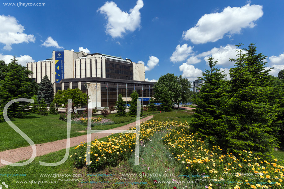 SOFIA, BULGARIA -MAY 20, 2018:  Flower garden and National Palace of Culture in Sofia, Bulgaria
