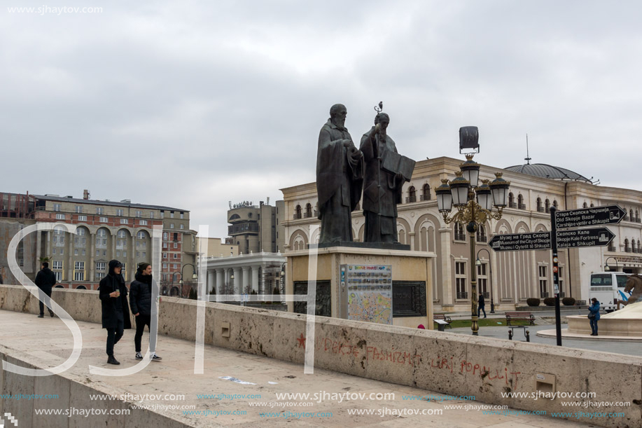 SKOPJE, REPUBLIC OF MACEDONIA - FEBRUARY 24, 2018:  Monument of St. Cyril and Methodius and Archaeological Museum in city of  Skopje, Republic of Macedonia