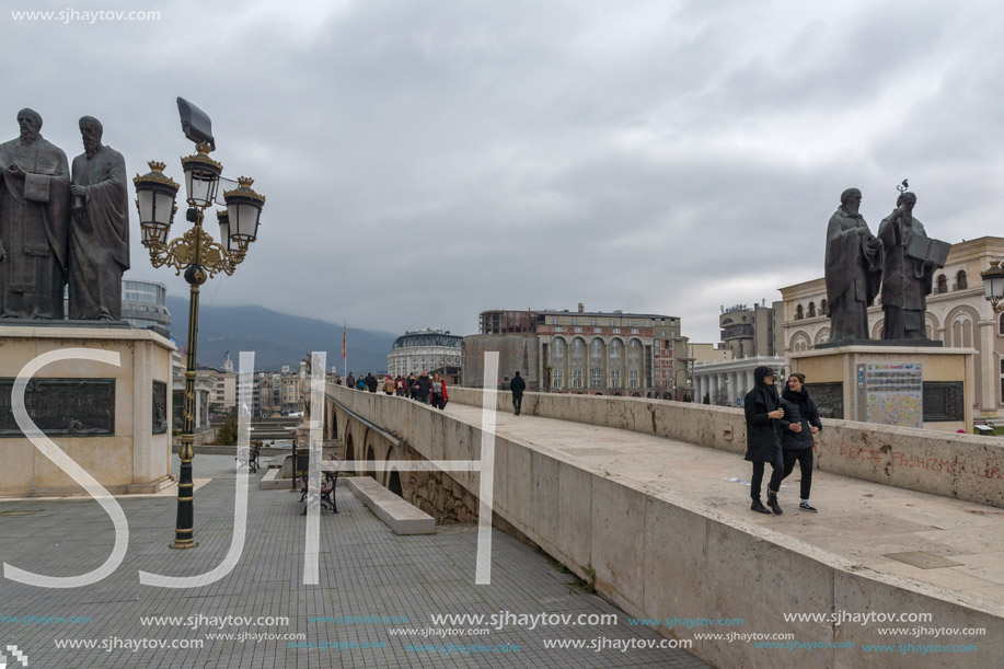 SKOPJE, REPUBLIC OF MACEDONIA - FEBRUARY 24, 2018:  Monument of St. Cyril and Methodius and Archaeological Museum in city of  Skopje, Republic of Macedonia