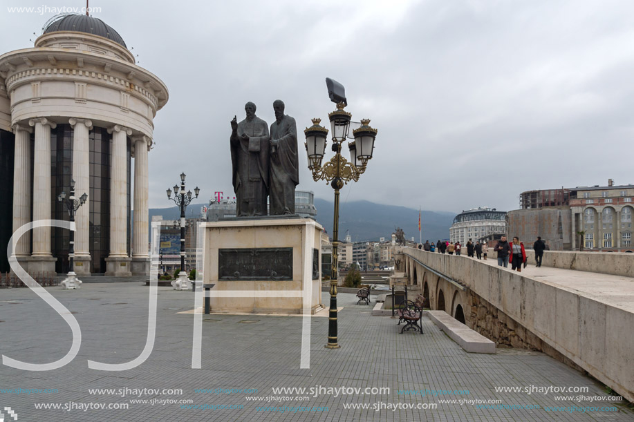 SKOPJE, REPUBLIC OF MACEDONIA - FEBRUARY 24, 2018:  Monument of St. Cyril and Methodius and Archaeological Museum in city of  Skopje, Republic of Macedonia