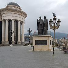 SKOPJE, REPUBLIC OF MACEDONIA - FEBRUARY 24, 2018:  Monument of St. Cyril and Methodius and Archaeological Museum in city of  Skopje, Republic of Macedonia