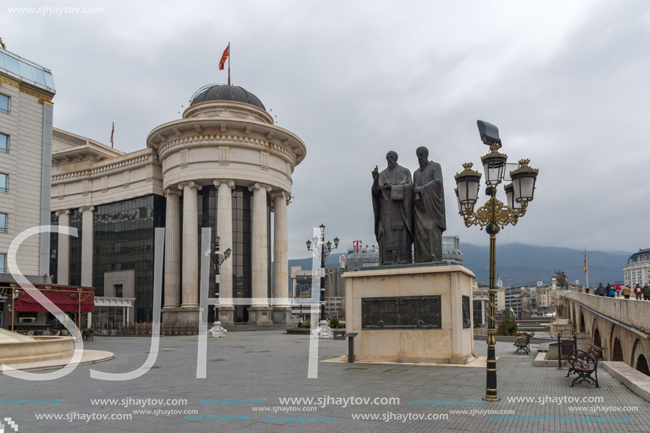 SKOPJE, REPUBLIC OF MACEDONIA - FEBRUARY 24, 2018:  Monument of St. Cyril and Methodius and Archaeological Museum in city of  Skopje, Republic of Macedonia