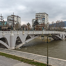SKOPJE, REPUBLIC OF MACEDONIA - FEBRUARY 24, 2018:  The Bridge of Civilizations and Vardar River in city of  Skopje, Republic of Macedonia