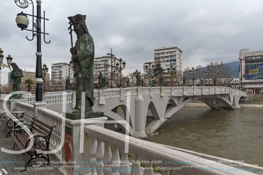 SKOPJE, REPUBLIC OF MACEDONIA - FEBRUARY 24, 2018:  The Bridge of Civilizations and Vardar River in city of  Skopje, Republic of Macedonia