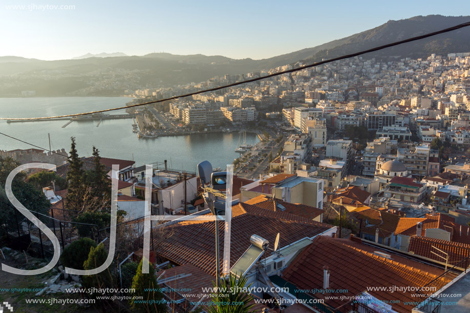 KAVALA, GREECE - DECEMBER 27, 2015: Sunset view of Ruins of fortress and Panorama to Kavala, East Macedonia and Thrace, Greece