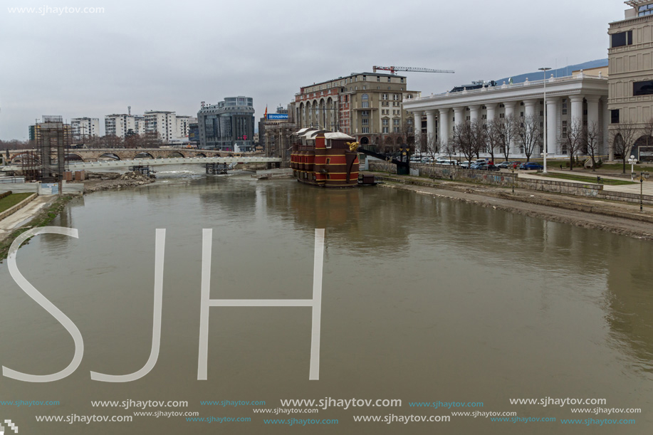 SKOPJE, REPUBLIC OF MACEDONIA - FEBRUARY 24, 2018: Vardar River passing through City of Skopje center, Republic of Macedonia