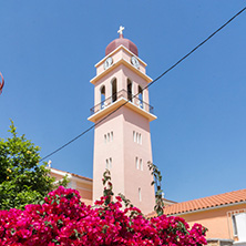 KARAVOMYLOS, KEFALONIA, GREECE - MAY 26, 2015: Orthodox Church with Flowers to Karavomylos town, Kefalonia, Ionian islands, Greece