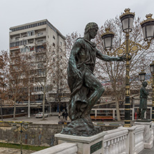 SKOPJE, REPUBLIC OF MACEDONIA - FEBRUARY 24, 2018:  Statue at  Bridge of Civilizations, Republic of Macedonia