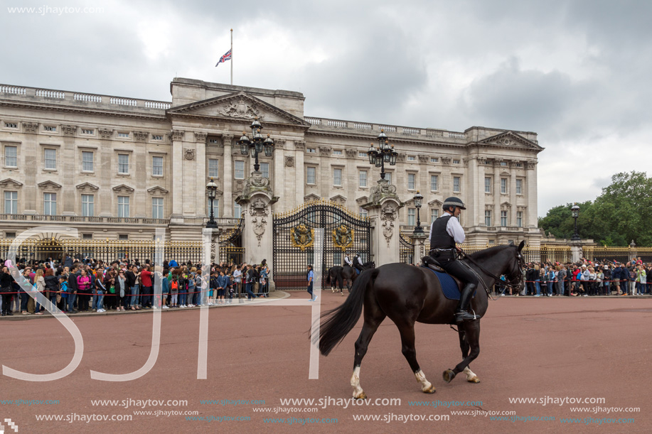 LONDON, ENGLAND - JUNE 17, 2016: British Royal guards perform the Changing of the Guard in Buckingham Palace, London, England, Great Britain