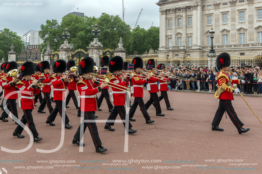 LONDON, ENGLAND - JUNE 17, 2016: British Royal guards perform the Changing of the Guard in Buckingham Palace, London, England, Great Britain