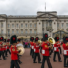 LONDON, ENGLAND - JUNE 17, 2016: British Royal guards perform the Changing of the Guard in Buckingham Palace, London, England, Great Britain