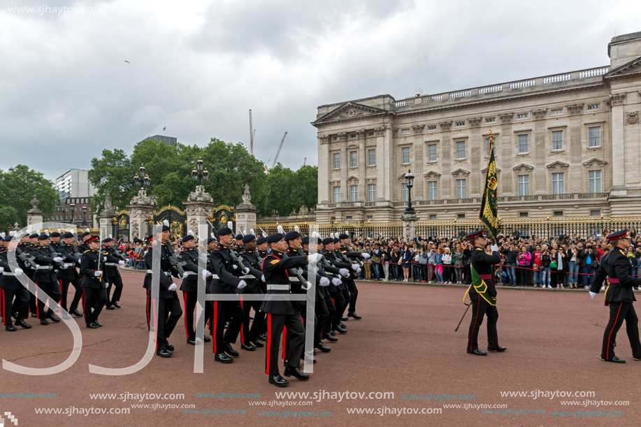 LONDON, ENGLAND - JUNE 17, 2016: British Royal guards perform the Changing of the Guard in Buckingham Palace, London, England, Great Britain