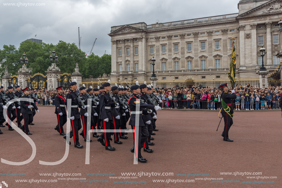 LONDON, ENGLAND - JUNE 17, 2016: British Royal guards perform the Changing of the Guard in Buckingham Palace, London, England, Great Britain