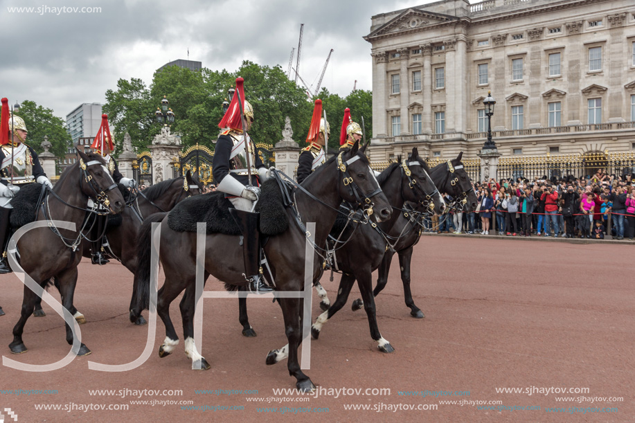 LONDON, ENGLAND - JUNE 17, 2016: British Royal guards perform the Changing of the Guard in Buckingham Palace, London, England, Great Britain