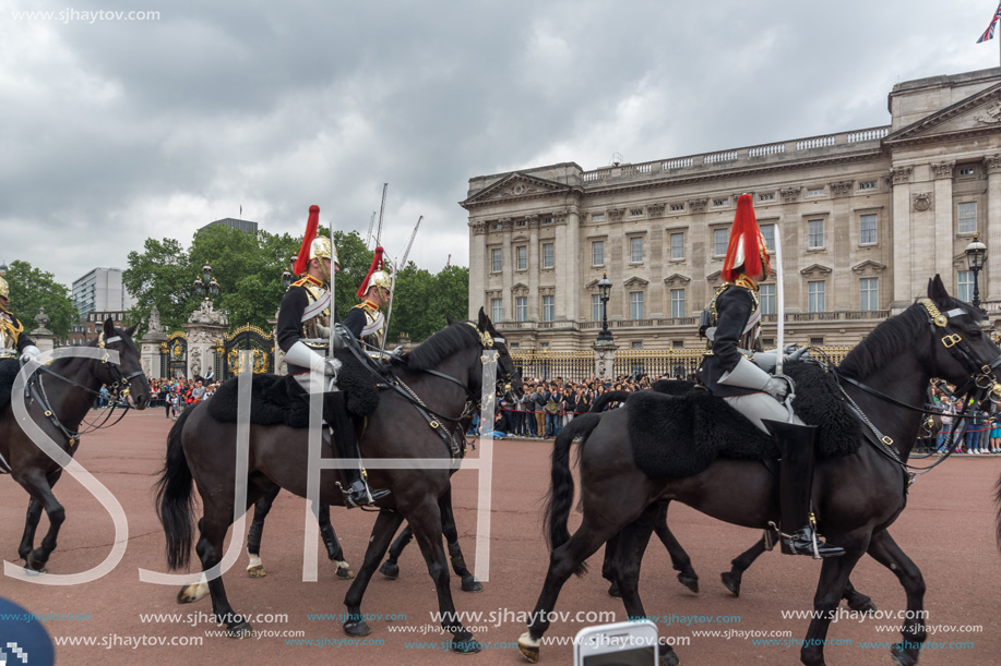 LONDON, ENGLAND - JUNE 17, 2016: British Royal guards perform the Changing of the Guard in Buckingham Palace, London, England, Great Britain