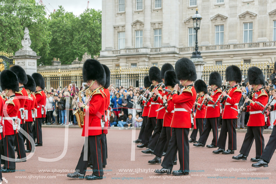 LONDON, ENGLAND - JUNE 17, 2016: British Royal guards perform the Changing of the Guard in Buckingham Palace, London, England, Great Britain