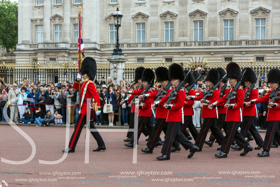 LONDON, ENGLAND - JUNE 17, 2016: British Royal guards perform the Changing of the Guard in Buckingham Palace, London, England, Great Britain