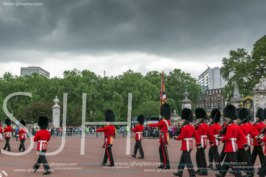 LONDON, ENGLAND - JUNE 17, 2016: British Royal guards perform the Changing of the Guard in Buckingham Palace, London, England, Great Britain