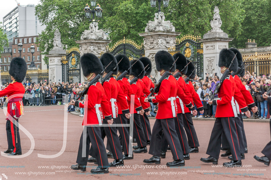 LONDON, ENGLAND - JUNE 17, 2016: British Royal guards perform the Changing of the Guard in Buckingham Palace, London, England, Great Britain