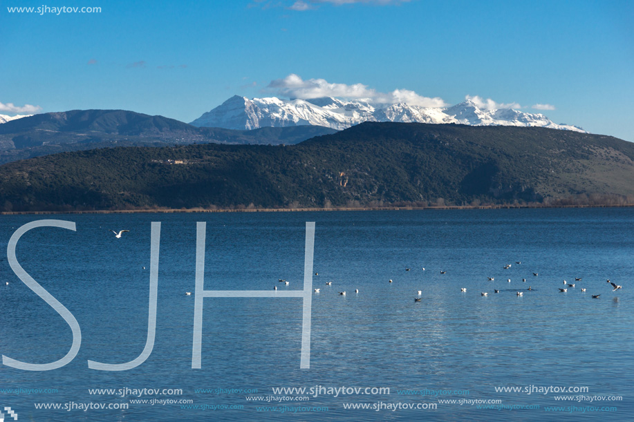 Amazing winter Landscape of Lake Pamvotida and Pindus mountain from city of Ioannina, Epirus, Greece