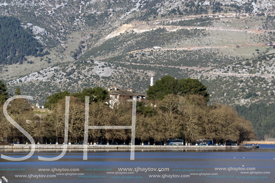 Amazing winter Landscape of Lake Pamvotida and Pindus mountain from city of Ioannina, Epirus, Greece