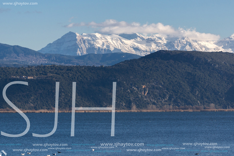 Amazing winter Landscape of Lake Pamvotida and Pindus mountain from city of Ioannina, Epirus, Greece