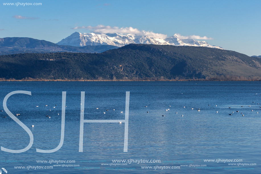 Amazing winter Landscape of Lake Pamvotida and Pindus mountain from city of Ioannina, Epirus, Greece