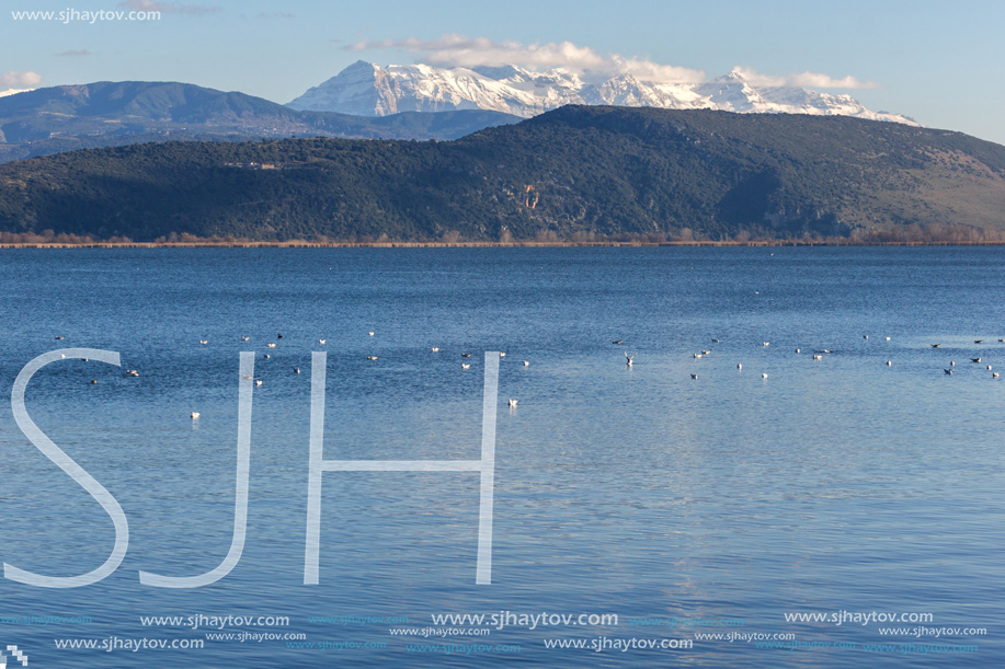 Amazing winter Landscape of Lake Pamvotida and Pindus mountain from city of Ioannina, Epirus, Greece