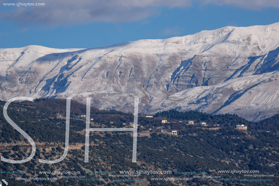 Amazing winter Landscape of Lake Pamvotida and Pindus mountain from city of Ioannina, Epirus, Greece