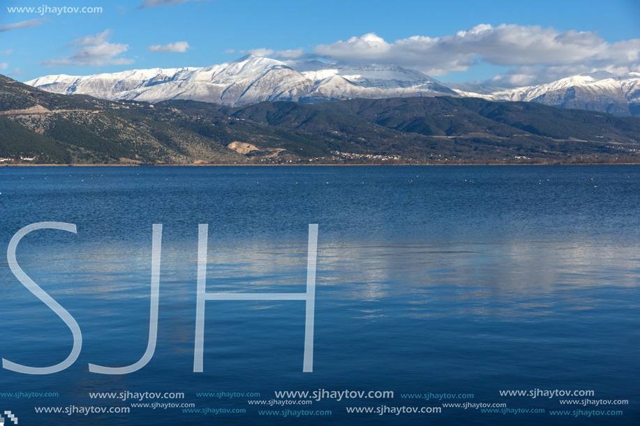 Amazing winter Landscape of Lake Pamvotida and Pindus mountain from city of Ioannina, Epirus, Greece