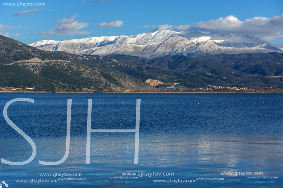 Amazing winter Landscape of Lake Pamvotida and Pindus mountain from city of Ioannina, Epirus, Greece