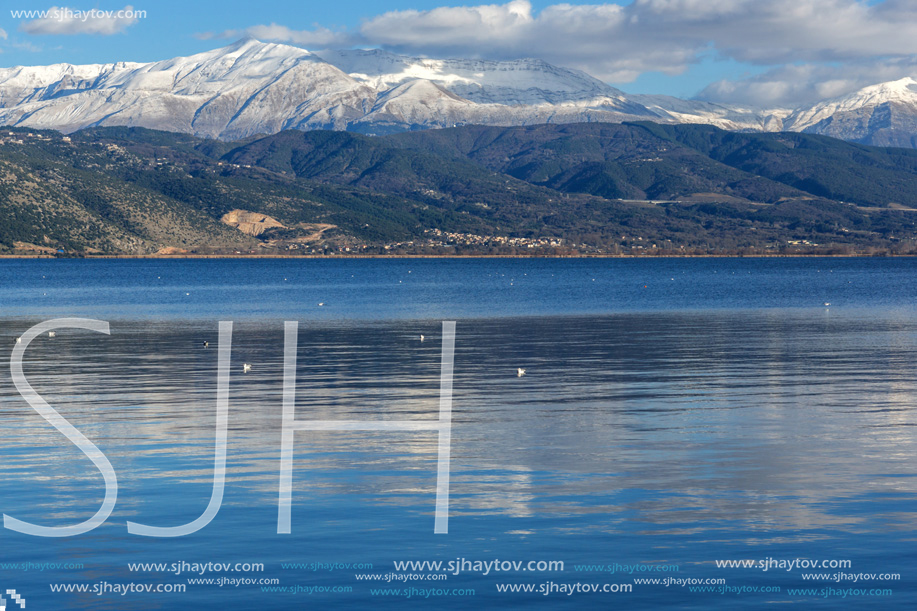 Amazing winter Landscape of Lake Pamvotida and Pindus mountain from city of Ioannina, Epirus, Greece