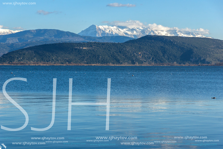 Amazing winter Landscape of Lake Pamvotida and Pindus mountain from city of Ioannina, Epirus, Greece