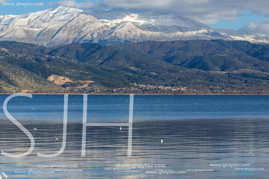 Amazing winter Landscape of Lake Pamvotida and Pindus mountain from city of Ioannina, Epirus, Greece