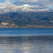 Amazing winter Landscape of Lake Pamvotida and Pindus mountain from city of Ioannina, Epirus, Greece