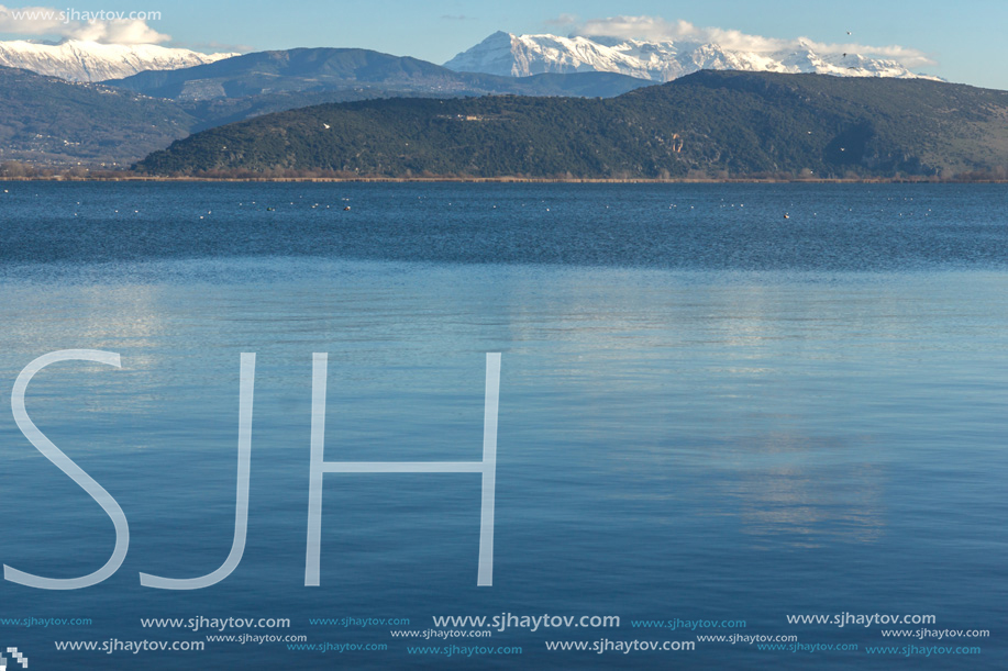 Amazing winter Landscape of Lake Pamvotida and Pindus mountain from city of Ioannina, Epirus, Greece