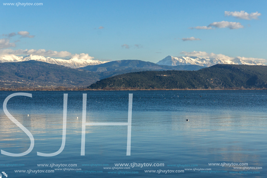 Amazing winter Landscape of Lake Pamvotida and Pindus mountain from city of Ioannina, Epirus, Greece