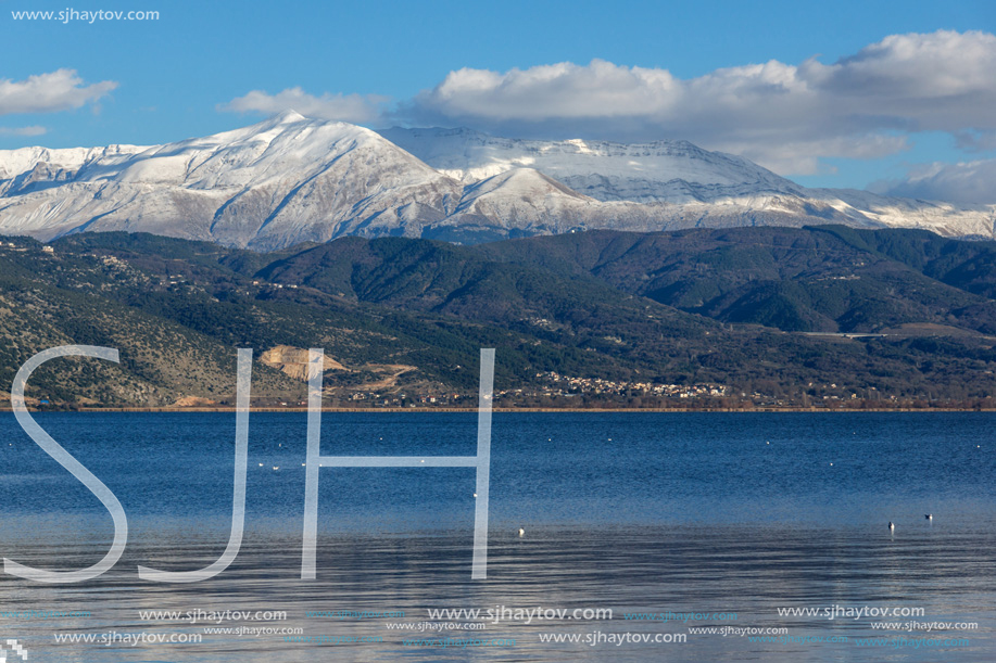 Amazing winter Landscape of Lake Pamvotida and Pindus mountain from city of Ioannina, Epirus, Greece