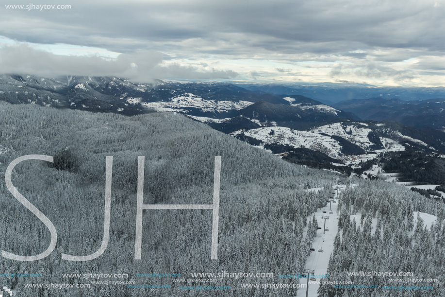 Amazing winter landscape of Rhodope Mountains near Pamporovo resort from Snezhanka tower, Smolyan Region, Bulgaria