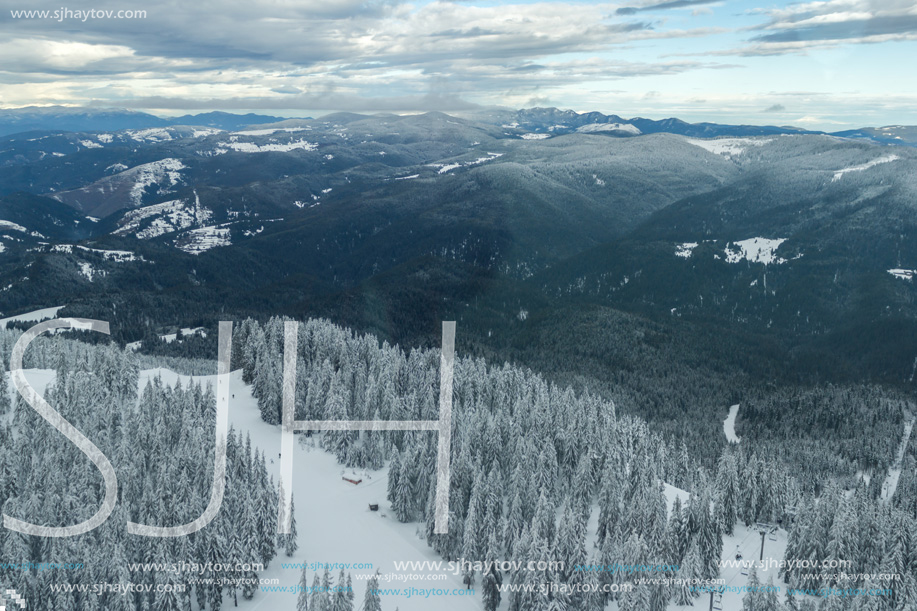 Amazing winter landscape of Rhodope Mountains near Pamporovo resort from Snezhanka tower, Smolyan Region, Bulgaria