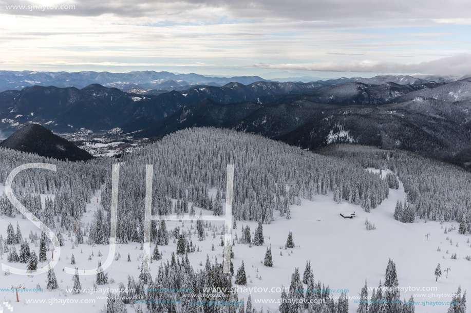 Amazing winter landscape of Rhodope Mountains near Pamporovo resort from Snezhanka tower, Smolyan Region, Bulgaria