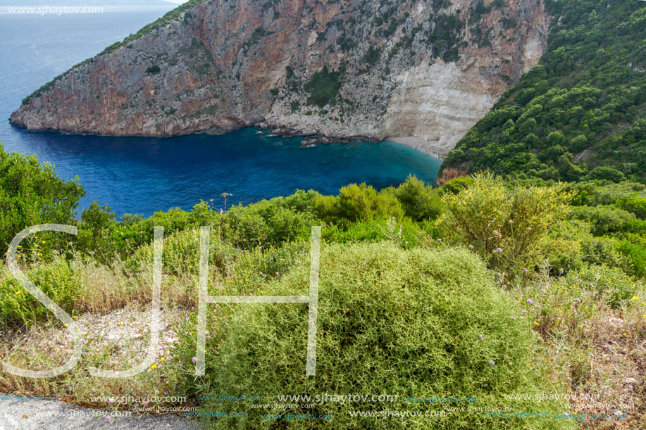 Blue water and rocks of beach at Zakynthos island, Greece